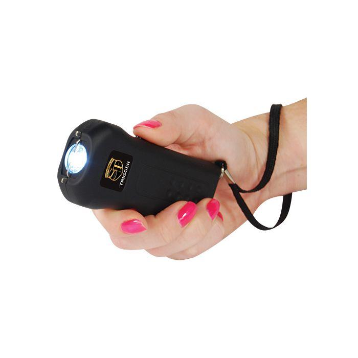 Stun gun with safety strap